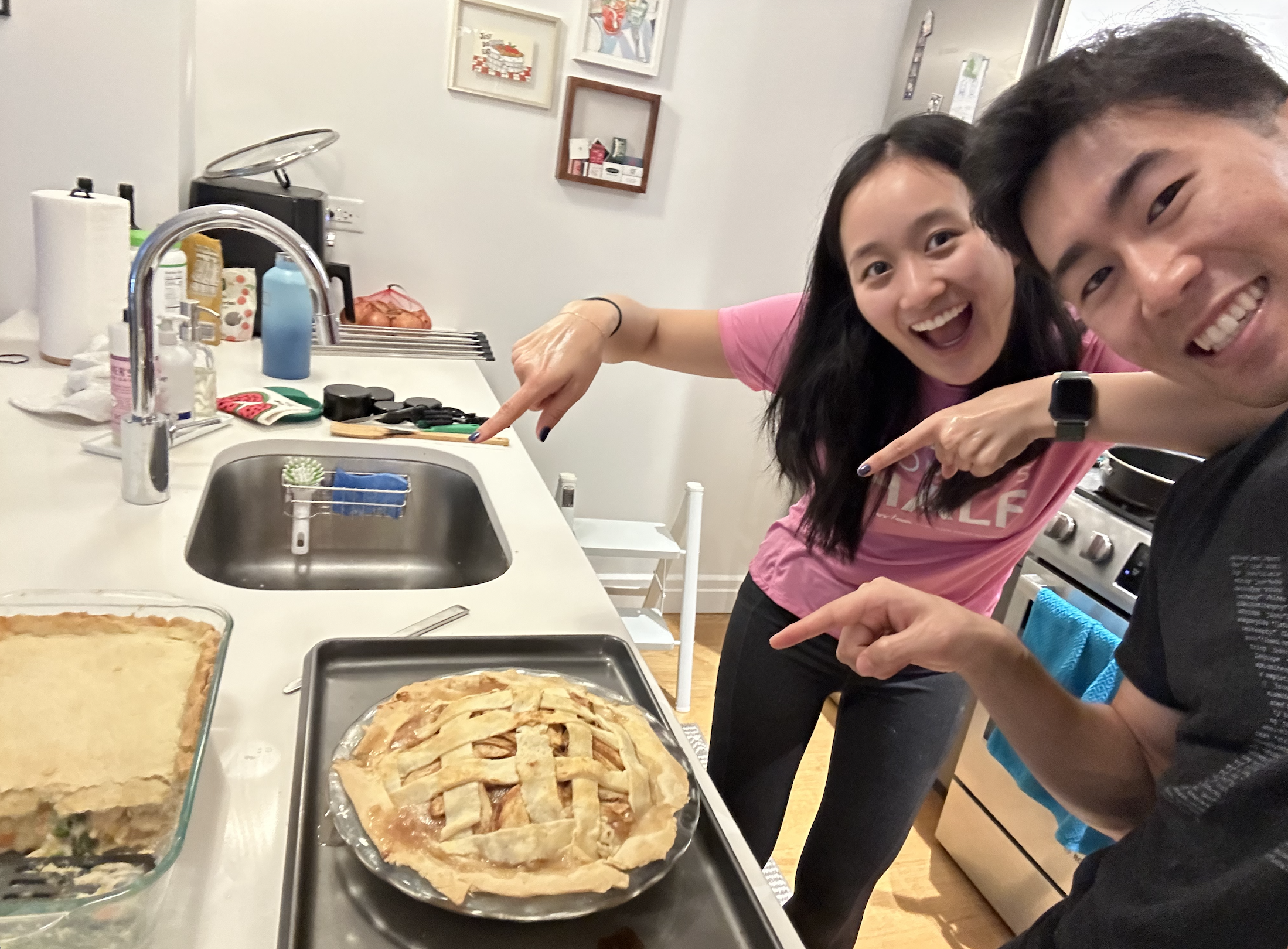 Christina and Erik baking a pie in their first apartment